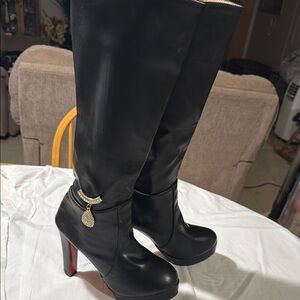 Chic Black Heeled Boots with Embellishment